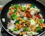 A picture of step 4 of Walnut Schezwan Stir Fry.