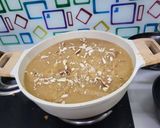 A picture of step 2 of Ashtami Bhog Thali (Halwa, Puri, Kala Chana).