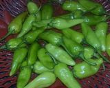 A picture of step 1 of Masaly bhari hari mirch k pakoray.