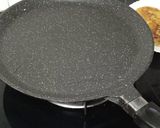 A picture of step 7 of Anday Wala burger.