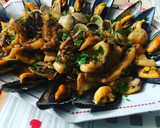 Foto del paso 7 de la receta: Sepia encebollada con almejas y mejillones al vapor