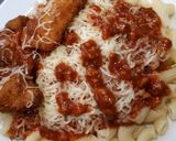Bolognai csirkecombfilé, szarvacska tésztával recept fázis 4 fotója
