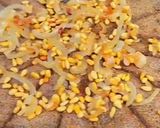 A picture of step 12 of Kibbee Busta (Baked Kibbee with onion and pine nuts).