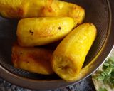 A picture of step 2 of Patacones or Tostones with minced chicken topping.