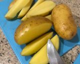 A picture of step 1 of Homemade Air-Fried Potato Wedges.