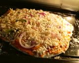 A picture of step 6 of Pizza with fresh pizza dough.