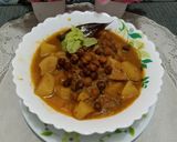 A picture of step 9 of Desi Spiced Chickpeas and Potatoes.
