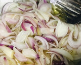 A picture of step 4 of Karele Pyaaz.