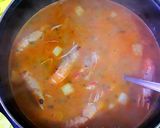 Foto del paso 27 de la receta Sopa de marisco congelado y fresco con fondo de cebolletas