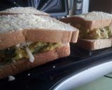 A picture of step 4 of Cheesey guacamole sandwich.
