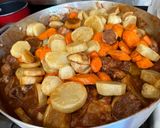 A picture of step 5 of Easy Chicken Afritada.