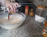 Foto del paso 5 de la receta: Cupcakes de pera relleno de bombón