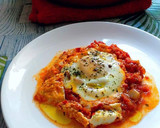 Foto del paso 5 de la receta: Huevos en salsa de tomates y toque de especias