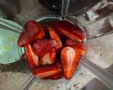 A picture of step 2 of Strawberry orange twister.