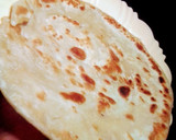 A picture of step 5 of Chapatis, soft and layered.