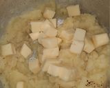 Foto del paso 5 de la receta: Milanesa al horno con puré y queso mantecoso