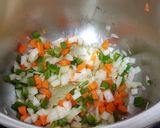Foto del paso 3 de la receta: Sopa de garbanzos con pota y jamón