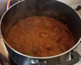 A picture of step 7 of Meat balls in tomato Concasee' with stir fried rice.