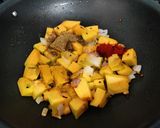 A picture of step 1 of Kaddu ki sabzi (pumpkin sabzi).