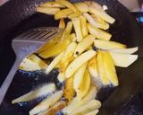 A picture of step 1 of Achari Aloo Baingan.