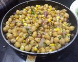 A picture of step 3 of Corn chana roll.