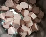 A picture of step 3 of Sausage akara.