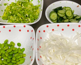 A picture of step 1 of New Onion and Cucumber Salad.