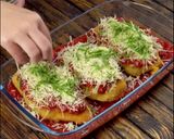 Une image de l'étape 3 de Escalopes farcies sur un lit de sauce tomate.