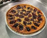 Une image de l'étape 11 de Tarte aux prunes, miel et amandes.