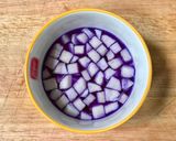 A picture of step 2 of Tubtim Krob in Butterfly Pea Flower Tea Latte.