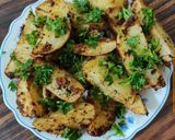 A picture of step 1 of Garlic Potatoes Wedges.