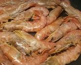 A picture of step 2 of King prawns in a brandy and lemon sauce.