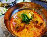 A picture of step 20 of Chicken makhni karahi.