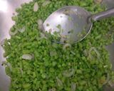 A picture of step 3 of Spinach stem poriyal.