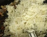 A picture of step 4 of Pulliyogre Rice.