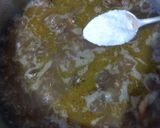 A picture of step 10 of Beef pilau with tinge of coconut.