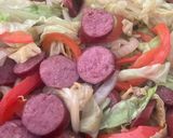A picture of step 5 of Kielbasa with Bell peppers and Cabbage 🥬🫑.
