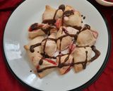 A picture of step 16 of Strawberry Stuffed Baked Samosa with Chocolate Ganache.