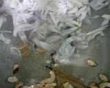 A picture of step 3 of Coconut milk pulao.