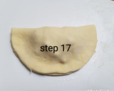 A picture of step 18 of Bow tie buns.