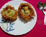 A picture of step 5 of Chawal bada in noodles basket.
