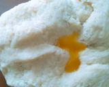 A picture of step 5 of Custard filled Donuts.