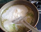 A picture of step 4 of Suji coconut balls.
