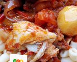A picture of step 10 of Fish and potatoe sauce with palm oil.