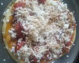 A picture of step 3 of Cheesy pizza.