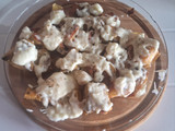 Papas y boniato al horno con salsa blanca
