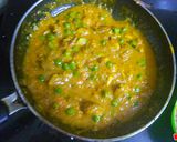 A picture of step 9 of Jackfruit seeds and peas in yellow gravy.