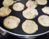 A picture of step 4 of Moong Dal Appe with vegetables.