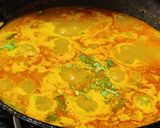 A picture of step 5 of Kasuri methi poori with potato curry.