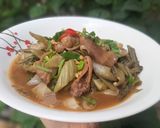 Hình bước làm 3 của món Lòng cá lóc xào dưa chua